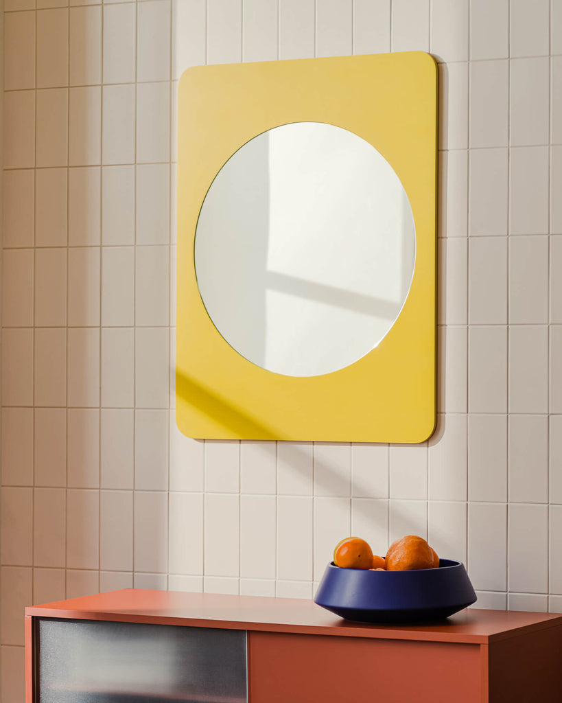 Aku Mirror - large, round, yellow wall mirror. 90 x 70 cm - noo.ma